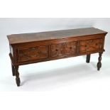 A 17th century oak low dresser