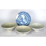 A Chinese export blue and white dish to/w three South East Asian bowls