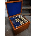 Edwardian oak canteen, fitted with set of fiddle pattern silver flatware