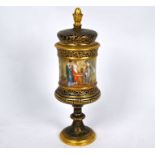 A 19th century Vienna porcelain urn and cover
