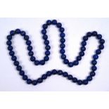 A single row of uniform lapis lazuli beads