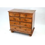 A William & Mary walnut chest of two short over three long graduated drawers