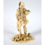 A 19th century Japanese ivory okimono of a fisherman, Meiji period (1868-1912)