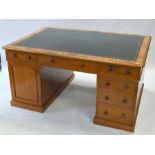 A late Victorian mahogany partners desk