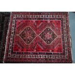 A Persian Shiraz carpet, 212 cm x 171 cm