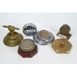 Collection of six various advertising paperweights