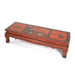 A Chinese red lacquer kang table