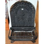 An old cast iron fireback and fire basket (2)