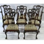 A set of eight mahogany Chippendale-style dining chairs