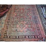 An old Persian Hamadan carpet, 322 cm x 219 cm
