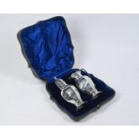 Edwardian cased silver cream and sugar pair