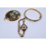 Victorian gold bangle, watch and brooch