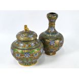 An early 20th century Chinese cloisonne vase and jar with matching polychrome decoration
