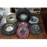 Twenty-four various rubber tyre advertising ashtrays