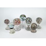 Four antique floral glass pedestal paperweights