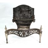 An Adam style polished steel and cast iron fire basket
