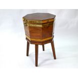 A George III octagonal brass bound mahogany wine cooler on stand