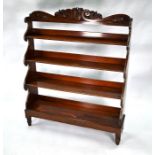 A Regency mahogany open waterfall bookcase