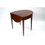 A George III century boxwood inlaid satinwood drop leaf table