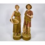 A pair of Royal Dux porcelain classical figures
