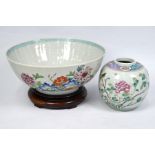 A 19th century Chinese famille rose punch bowl, 26 cm diameter and famille rose ginger jar