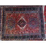 A Persian Heriz rug, 186 cm x 147 cm