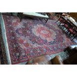 A large Persian Tabriz carpet, 395 cm x 250 cm