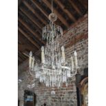 An impressive vintage electro-plated crystal hung eight branch electrolier