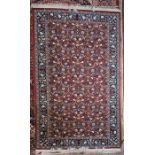 A Turkish Hereke rug, 236 cm x 142 cm