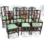 A set of twelve mahogany framed vase-back dining chairs