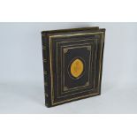 A very fine leather bound manuscript album