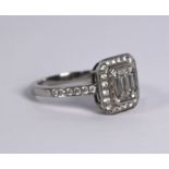 A rectangular diamond cluster ring