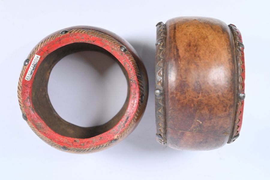 A pair of contemporary leather-bound terracotta heavy circular bracelets - Image 2 of 3