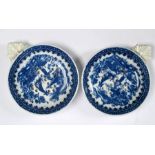 A pair of First Period Worcester blue and white egg-drainers