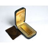 A Dunhill gilt metal textured brick cigarette lighter