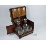 A Victorian ebony and burr walnut decanter box and associated glasswares