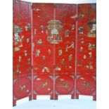 A late 19th century Chinese red lacquered screen