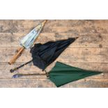 Three various parasols/umbrellas