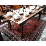 An antique French applewood kitchen table