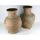 A pair of Chinese Han style Hu vases with taotie mask handles, 46 cm high