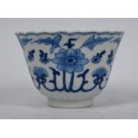 An 18th century Chinese blue and white tea bowl and saucer, Kangxi period, Qing dynasty