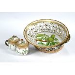 A Royal Copenhagen Flora Danica porcelain fruit basket and two custard cups and covers