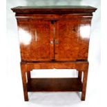 A William & Mary walnut / fruitwood cabinet on stand