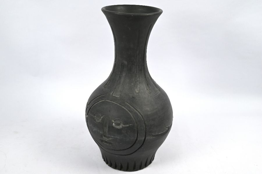 Pablo Picasso (1881-1973), a black faïence vase 'Visage grevé noir'