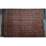 An antique Turkoman rug, 190 cm x 127 cm