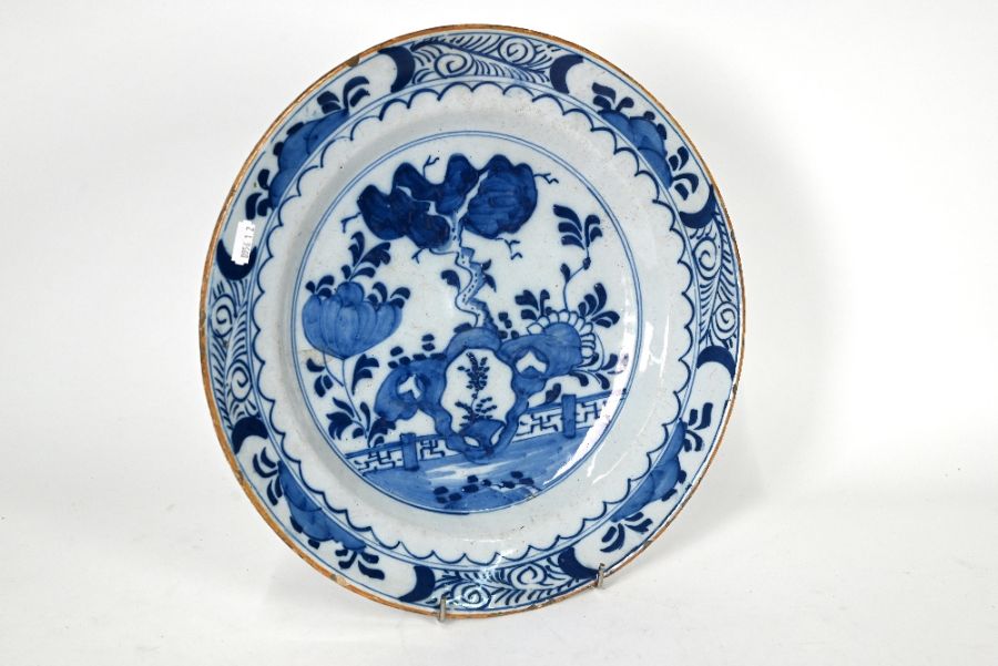 A 19th century Delft tin-glazed earthenware blue and white charger