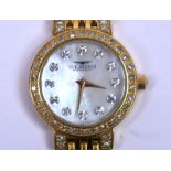 Lady's Eligio gilt metal diamond-set wristwatch