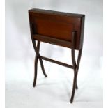 A Victorian mahogany folding campaign desk