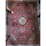 An old Persian Hamadan rug, 157 cm x 103 cm