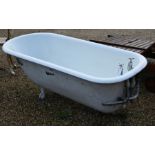 An old free-standing cast iron bath tub
